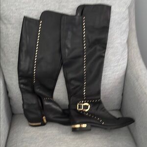 Chic Black Boots with Gold Accents